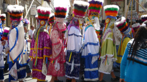 Costumed dancers fill the streets of Tarija, Bolivia celebrating the San Roque Festival