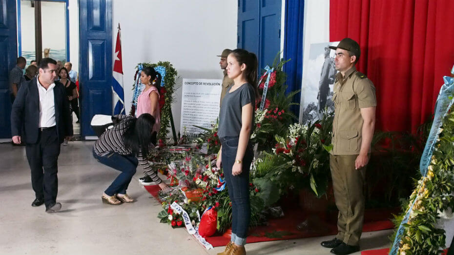 People lay flowers at the shrine for Fidel Castro.