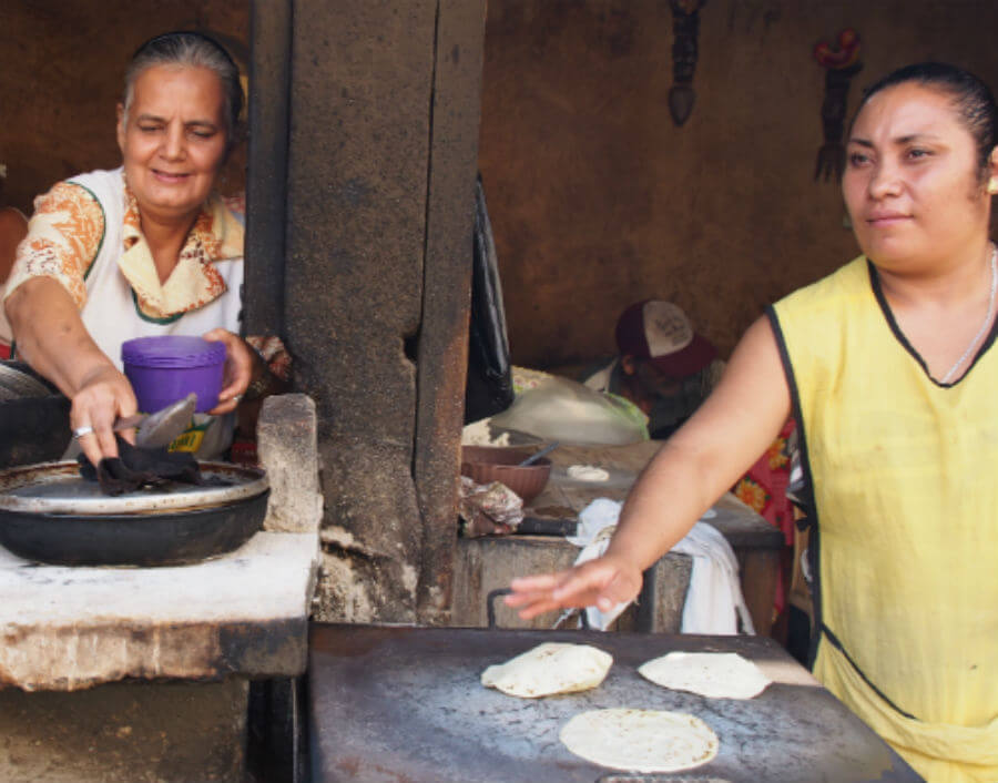 Nicaraguan ladies making tortillas